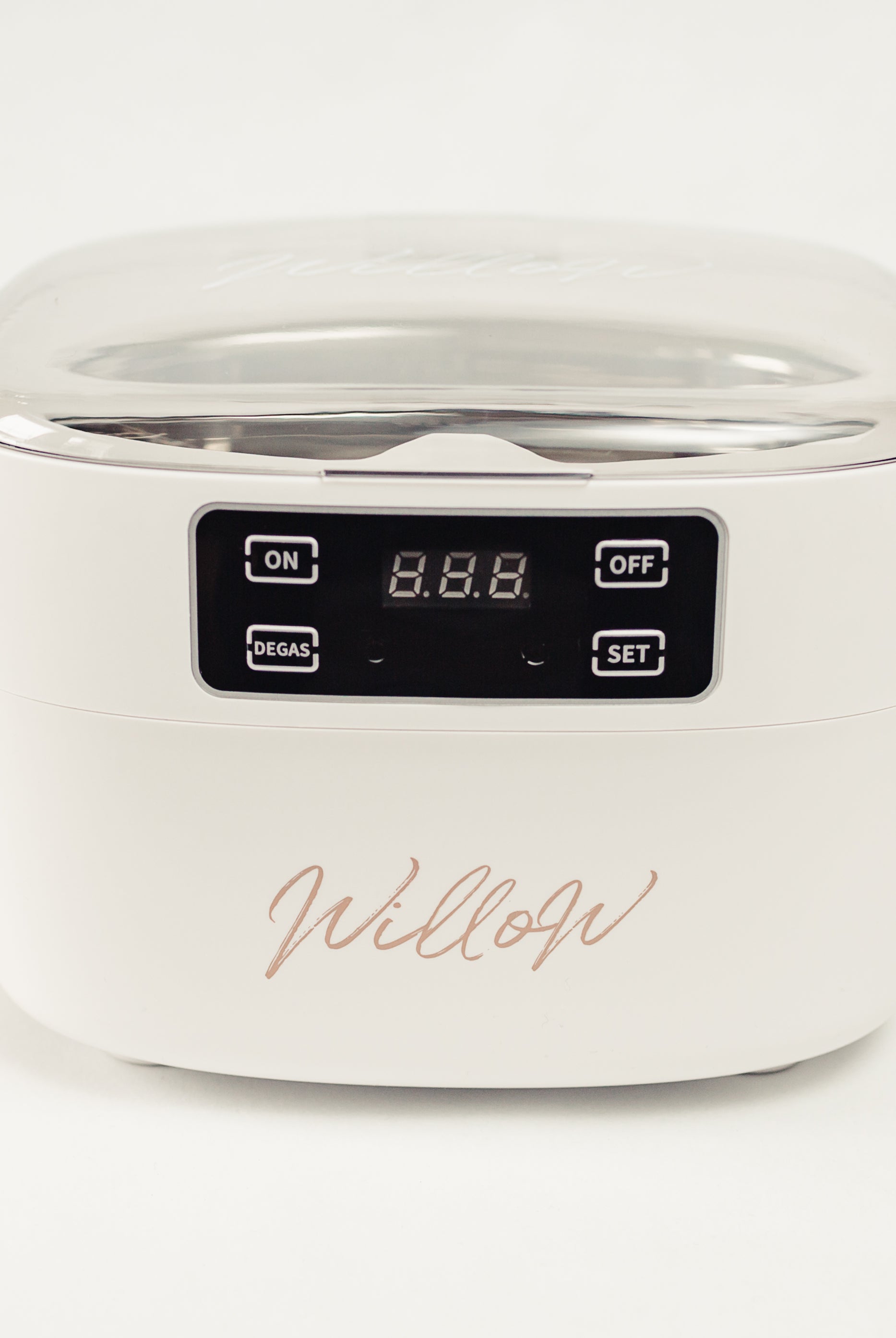 white ultrasonic cleaning machine with digital display and nude Willow branding