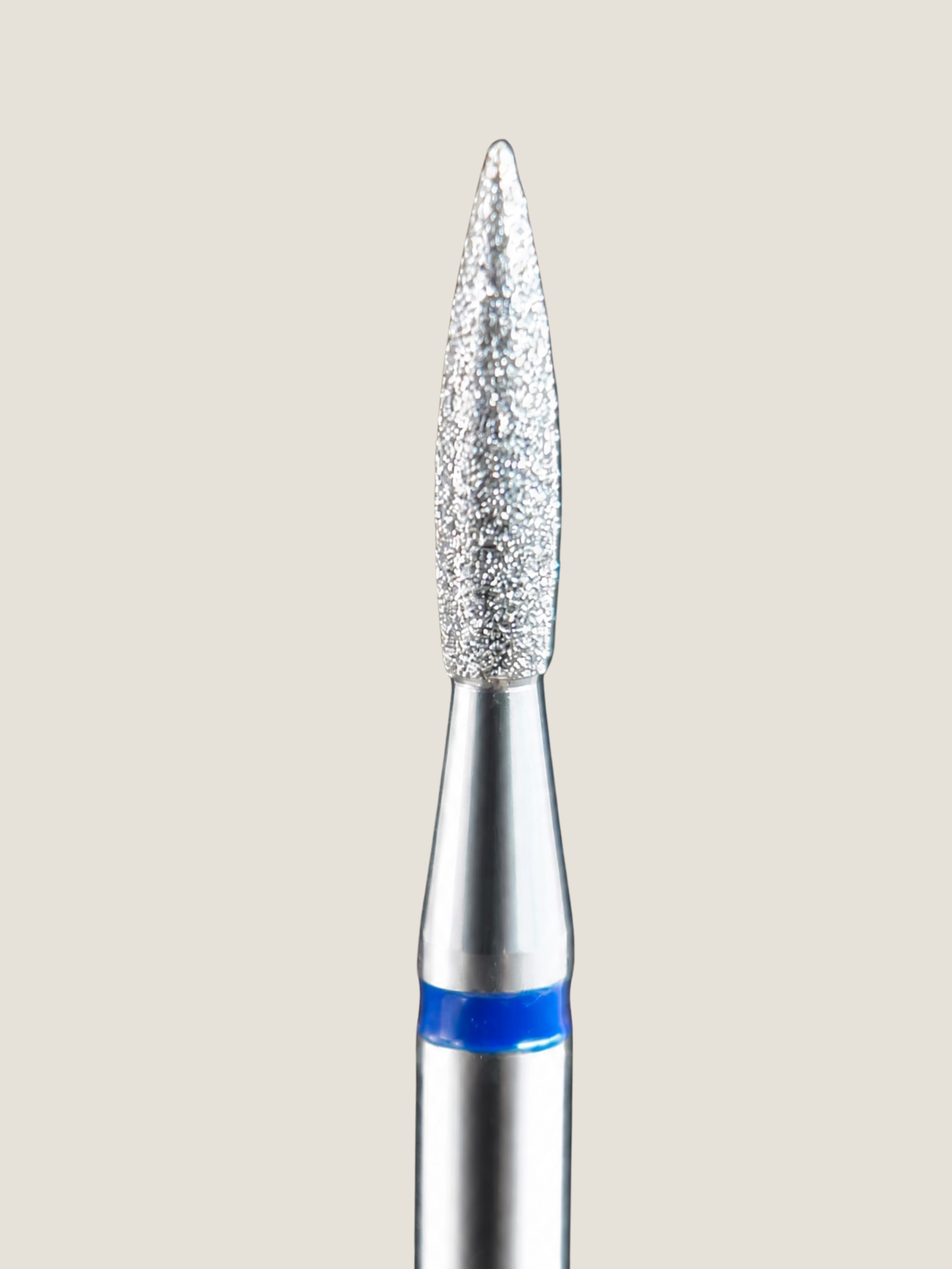 Platinum e-file bit in a medium grit, used for lifting the proximal nail fold