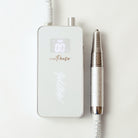 e-file pause flat-lay with handpiece 