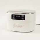 white ultrasonic cleanser with nude branding 