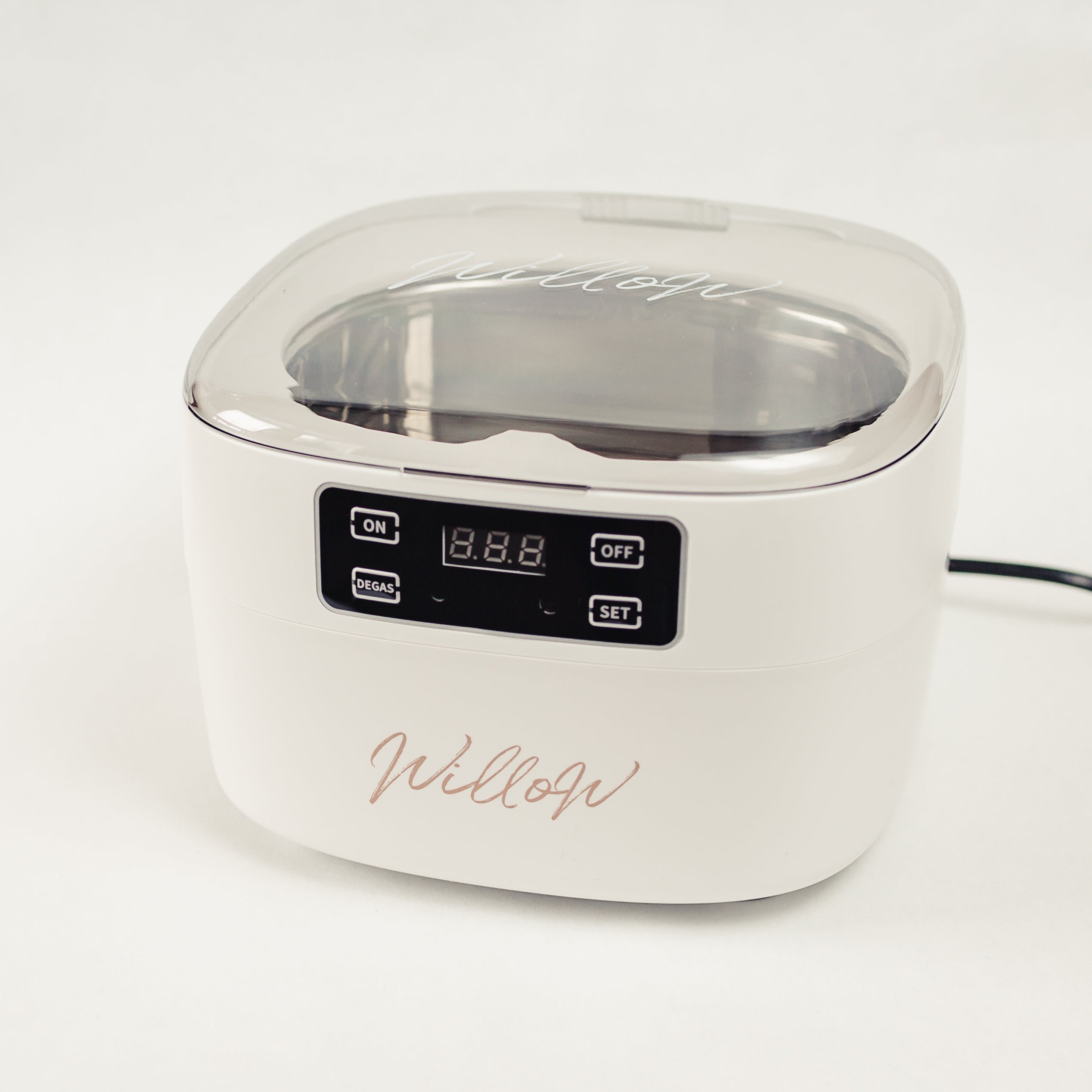 White Ultrasonic cleaner with nude branding and digital display 