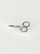 Silver cuticle scissors with 
Willow branding 