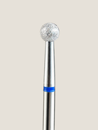 a close up of a platinum e-file bit a medium ball bit used to polish the cuticle area 
